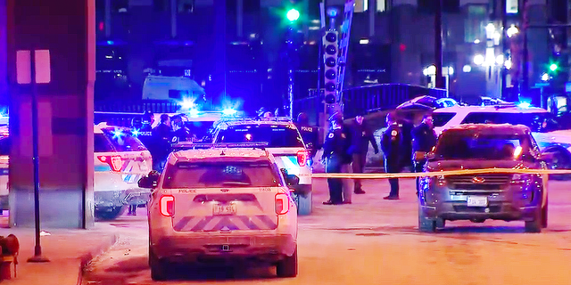 Chicago police attempted to pull over a carjacked vehicle on Monday night and traded gunfire with the suspects, shooting one and taking two others into custody.