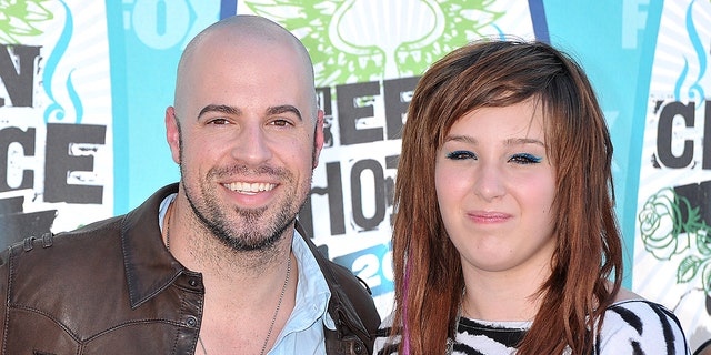 Chris Daughtry and his stepdaughter Hannah Price in 2010. The musician and his family said on Wednesday that she died by suicide.