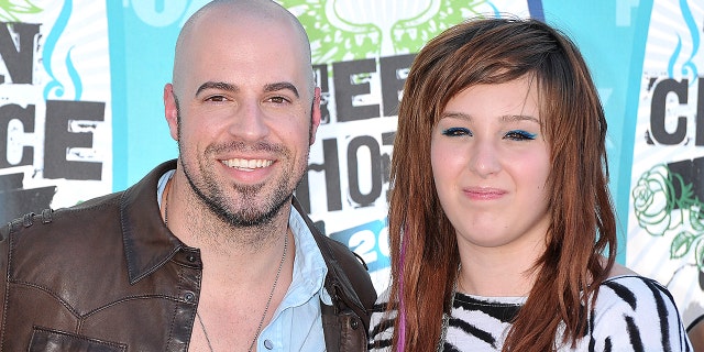Chris Daughtry and his stepdaughter Hannah Price in 2010. The musician and his family said on Wednesday that she died by suicide.