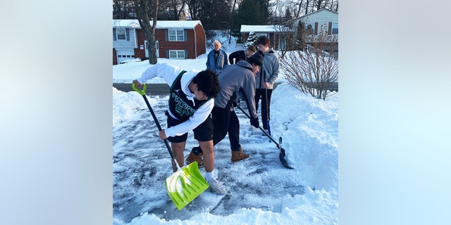 Di 40 high school football players shoveled driveways on Monday, DeLallo told Fox News Digital.
