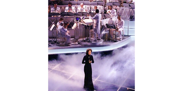 Celine Dion sings during the 70th Academy Awards at the Shrine Auditorium in Los Angeles. (Getty Images)