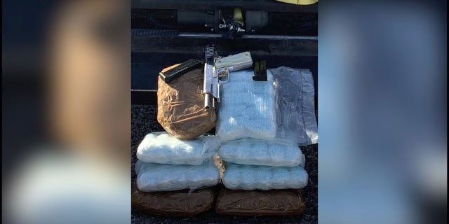 Semi-automatic pistol and drugs seized by Arizona DPS on Dec. 1, 2021