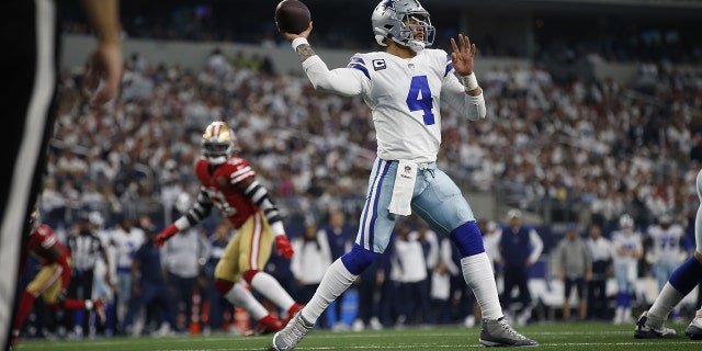 Dak Prescott (4) of the Dallas Cowboys passes during an NFC wild-card playoff game against the San Francisco 49ers Jan. 16, 2022, in Arlington, Texas. The 49ers defeated the Cowboys 23-17.