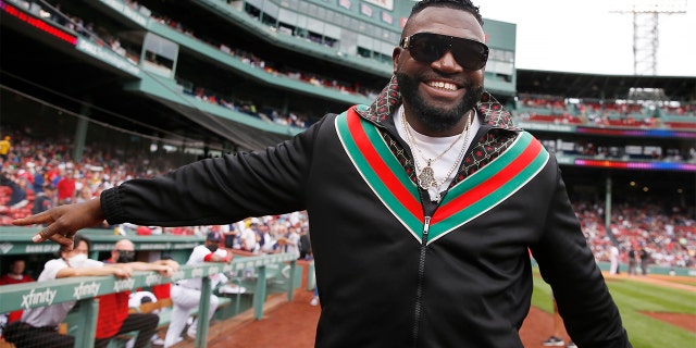 David Ortiz of the Red Sox walks on the field before a baseball game against the Cleveland Indians, Sept. 5, 2021, in Boston.