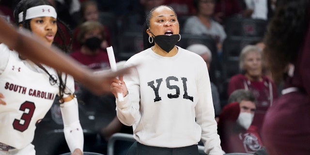 South Carolina head coach Dawn Staley communicates with players during the second half of an NCAA college basketball game against Mississippi State Sunday, Jan. 2, 2022, in Columbia, S.C. South Carolina won 80-68.