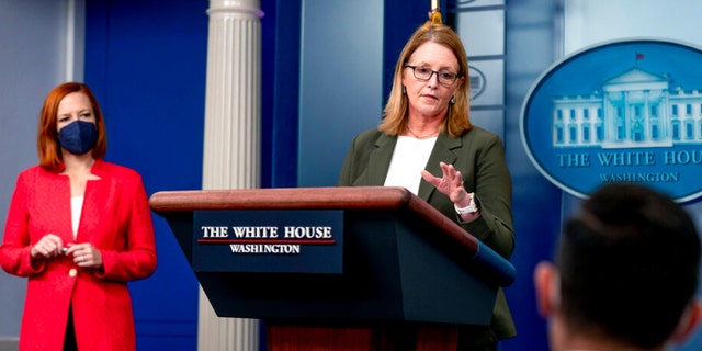 FEMA Administrator Deanne Criswell, accompanied by White House press secretary Jen Psaki, left, speaks at a press briefing at the White House in Washington, Friday, Jan. 14, 2022. (AP Photo/Andrew Harnik)