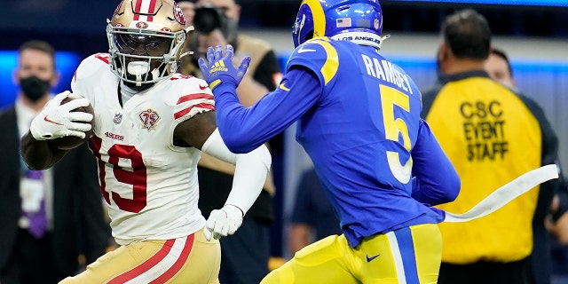San Francisco 49ers' Deebo Samuel (19) gets past Los Angeles Rams' Jalen Ramsey for a touchdown during the first half of the NFC Championship NFL football game Sunday, Jan. 30, 2022, in Inglewood, Calif.