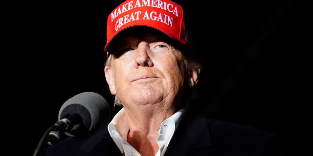 Former President Donald Trump pauses as he speaks at a rally Saturday, Jan. 15, 2022, in Florence, Ariz.