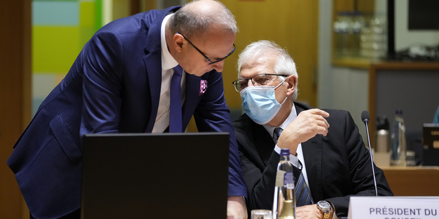 European Union foreign policy chief Josep Borrell, right, speaks with Croatia's Foreign Minister Gordan Grlic Radman during a meeting of EU foreign ministers at the European Council building in Brussels, Belgium, on Monday.