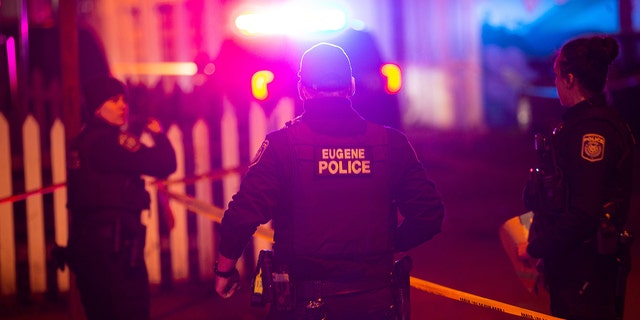 Eugene Police secure the scene of a shooting outside the WOW Hall in Eugene, Oregon, on Friday night