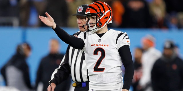 Kicker Evan McPherson of the Cincinnati Bengals lines up his game-winning kick against the Tennessee Titans on Jan. 22, 2022, in Nashville.
