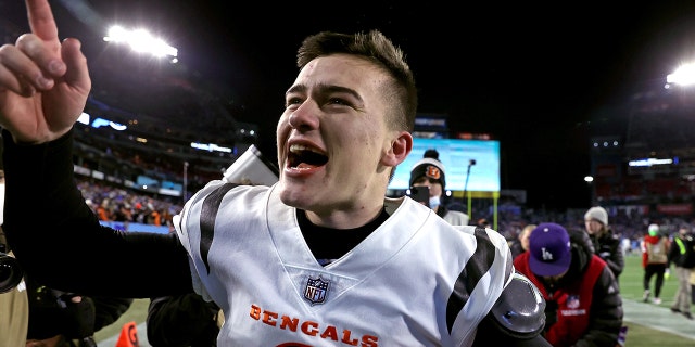 Bengals kicker Evan McPherson celebrates after hitting the game-winning field goal at Nissan Stadium on Jan. 22, 2022, in Nashville, Tennessee.