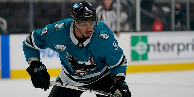 FILE - In this May 12, 2021, file photo, San Jose Sharks' Evander Kane (9) looks on during an NHL hockey game against the Vegas Golden Knights in San Jose, Calif. 