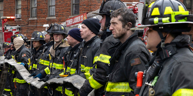 Firefighters work at the scene of a fatal fire at an apartment building in the Bronx on Sunday, Jan. 9, 2022, in New York. The majority of victims were suffering from severe smoke inhalation, FDNY Commissioner Daniel Nigro said.