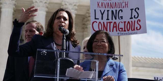 U.S. Sen. Kamala Harris (D-CA) (2nd L) speaks as Sen. Mazie Hirono (D-HI) (R) and Sen. Richard Blumenthal (D-CT) (L) listen during a rally in front of the U.S. Supreme Court September 28, 2018 in Washington, DC.