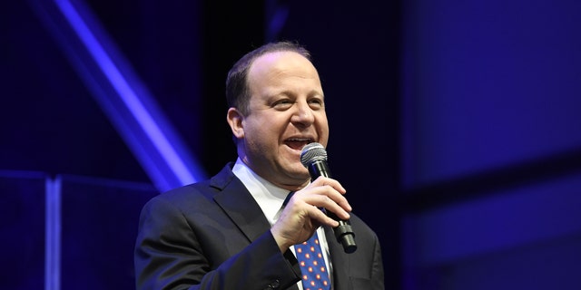 DENVER, CO - JANUARY 08: Colorado Governor Jared Polis' on stage during the Blue Sneaker Ball at the Denver Museum of Nature and Science January 05, 2019.