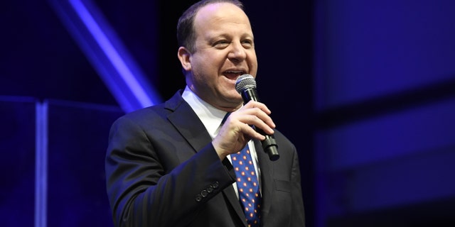 DENVER, CO - JANUARY 08: Colorado Governor Jared Polis' on stage during the Blue Sneaker Ball at the Denver Museum of Nature and Science January 05, 2019.
