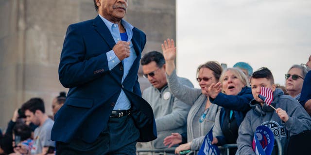 Rep. Emanuel Cleaver, D-Mo., runs to the stage to introduce candidate Joe Biden during the Joe Biden Campaign Rally at the National World War I Museum and Memorial on March 7, 2020, in Kansas City, Missouri. (Photo by Kyle Rivas/Getty Images)