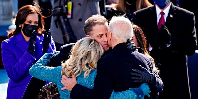 US President Joe Biden(R) is comforted by his son Hunter Biden and First Lady Jill Biden after being sworn in during the 59th presidential inauguration in Washington, DC on the West Front of the US Capitol on January 20, 2021 in Washington, DC.