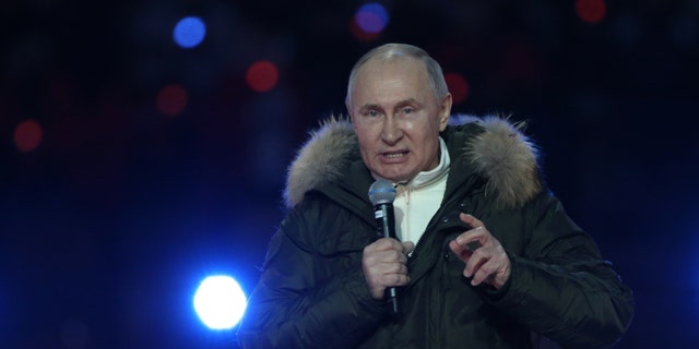 Putin speaks during a concert marking the 7th anniversary of Crimea annexation, on March 18, 2021, in Moscow, Russia.
