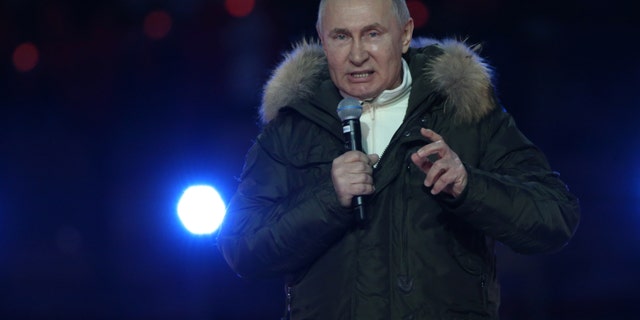 Putin speaks during a concert marking the 7th anniversary of Crimea annexation, on March 18, 2021, in Moscow, Russia.