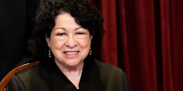 Associate Justice Sonia Sotomayor sits during a group photo of the Justices at the Supreme Court in Washington, DC on April 23, 2021. 