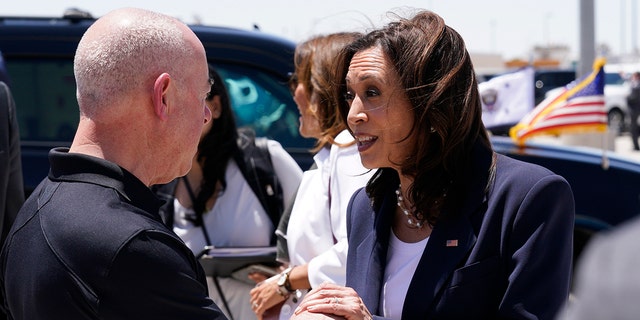 U.S. Vice President Kamala Harris speaks with Alejandro Mayorkas, secretary of the U.S. Department of Homeland Security, before boarding Air Force Two at the El Paso International Airport in El Paso, Texas, U.S., on Friday, June 25, 2021.  Photographer: Yuri Gripas/Abaca/Bloomberg via Getty Images