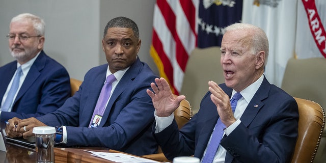 President Biden sits alongside Cedric Richmond as he meets with union and business leaders in the Roosevelt Room of the White House in Washington, D.C., July 22, 2021.