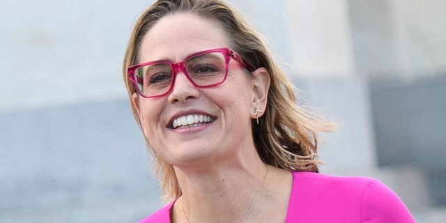 Oct, 28, 2021: Senator Kyrsten Sinema (R), D-AZ, departs from the US Capitol in Washington, DC.