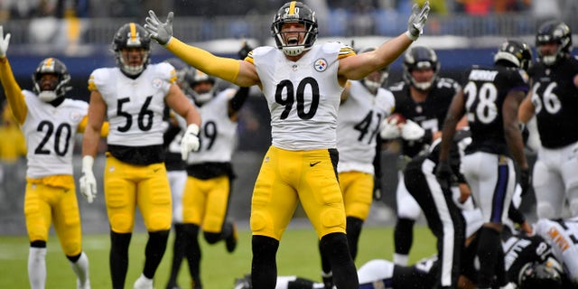 Pittsburgh linebacker T.J. Watt (90) celebrates after a first-quarter sack during the Steelers' game against the Baltimore Ravens Jan. 9, 2022, in Baltimore.