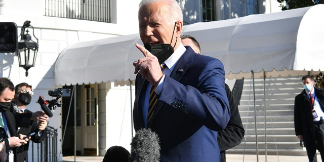US President Joe Biden speaks with reporters on the South Lawn before departing from the White House on Marine One on Jan. 11, 2022 in Washington, DC..