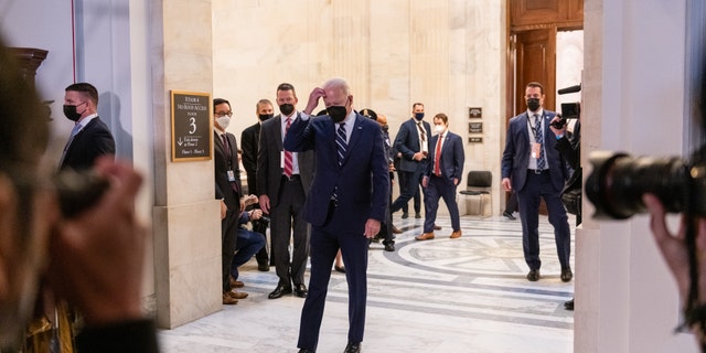 U.S. President Joe Biden arrives to speak after leaving a meeting with the Senate Democratic Caucus in Washington, DC, U.S., Thursday, January 13, 2022.