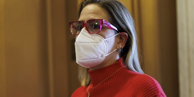 Sen. Kyrsten Sinema, a Democrat from Arizona, arrives at the U.S. Capitol in Washington, D.C., on Jan. 19, 2022.