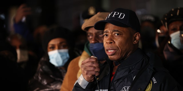 Mayor Eric Adams speaks as hundreds of police officers and FDNY officers gather at the 32nd Precinct for a vigil for two officers shot in Harlem Jan. 22, 2022.