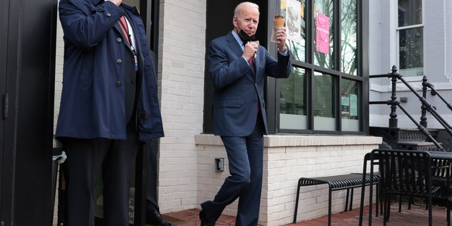 U.S. President Joe Biden holds an ice cream cone outside Jeni's Splendid Ice Cream in Washington, D.C., U.S., on Tuesday, Jan. 25, 2022. Photographer: Oliver Contreras/Sipa/Bloomberg via Getty Images