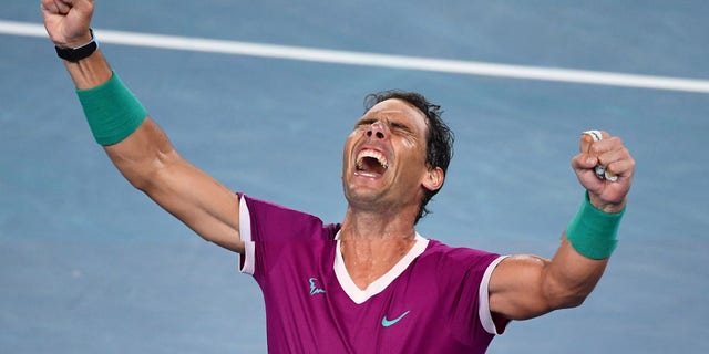 Rafael Nadal of Spain reacts after defeating Daniil Medvedev of Russia during his men's singles final match on the fourteenth day of the Australian Open tennis tournament in Melbourne on January 31, 2022.