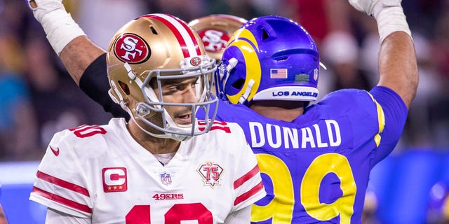 Rams defensive lineman Aaron Donald celebrates after 49ers quarterback Jimmy Garappolo failed to complete a pass for a first down, forcing a punt, during the NFC Championship Game on Sunday, Jan. 30, 2022 in Inglewood, California.