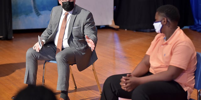 Secretary of Education Miguel Cardona speaks with Beverly Hills Middle School students, April 6, 2021, to promote the Biden administration's efforts to open schools for more in-person learning and in support of the American Rescue Plan.