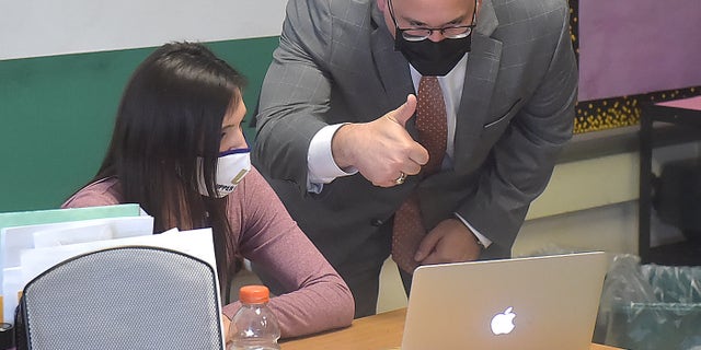 Upper Darby, PA. April 6 : US Secretary of Education, Miguel Cardona gives the thumbs up to virtual students  in Danielle Shalon's 7th grade math class at Beverly Hills Middle School  Tuesday April 6, 20201, He was on hand to promote the Biden Administration's efforts to open schools for more in-person learning and in support of the American Rescue Plan. (Photo by Pete Bannan/MediaNews Group/Daily Times via Getty Images)