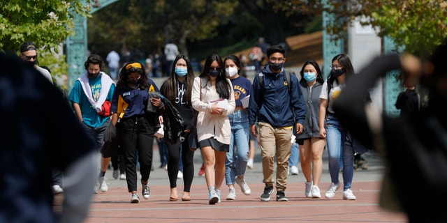 Students walk near the Sather Gate on the UC Berkeley campus in Berkeley, Calif., on Tuesday, Aug. 24, 2021. (Jane Tyska/Digital First Media/East Bay Times via Getty Images)