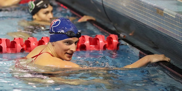 Lia Thomas of the Pennsylvania Quakers smiles after winning the 200 meter freestyle event during a tri-meet against the Yale Bulldogs and the Dartmouth Big Green at Sheerr Pool on the campus of the University of Pennsylvania on January 8, 2022 in Philadelphia, Pennsylvania.