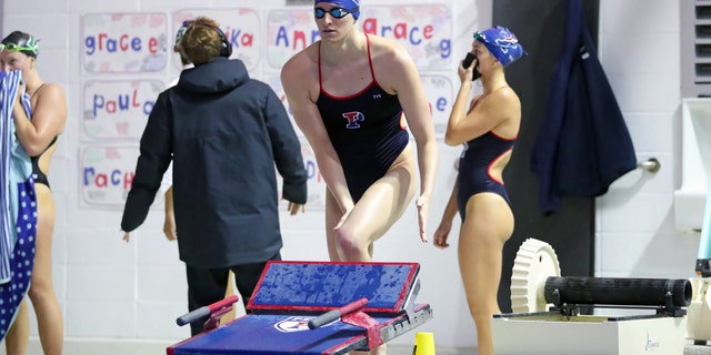 Lia Thomas of the Pennsylvania Quakers gets ready to compete in a freestyle event during a tri-meet against the Yale Bulldogs and the Dartmouth Big Green at Sheerr Pool on the campus of the University of Pennsylvania on Jan. 8, 2022, in Philadelphia, Pennsylvania.