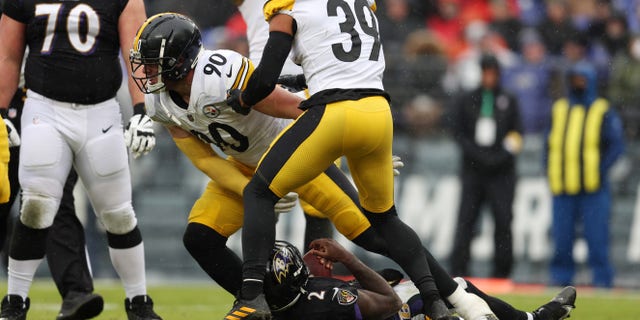 T.J. Watt of the Pittsburgh Steelers sacks Tyler Huntley of the Ravens at M&T Bank Stadium on Jan. 9, 2022, in Baltimore, Maryland.