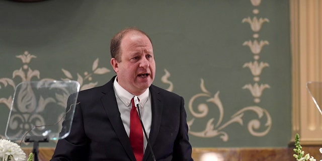 Gov. Jared Polis delivers his state of the state address at the Colorado State Capitol Building on Thursday, January 13, 2022. 