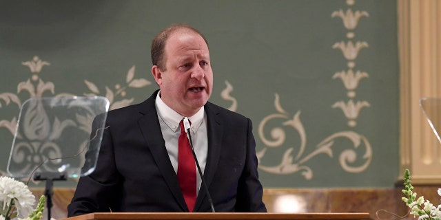 Gov. Jared Polis delivers his state of the state address at the Colorado State Capitol Building on Thursday, January 13, 2022. 