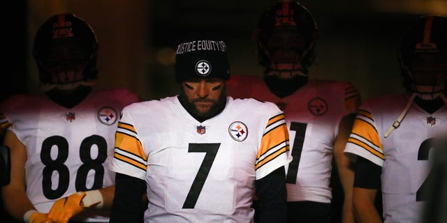 Ben Roethlisberger leads the Pittsburgh Steelers onto the field for the wild card game against the Kansas City Chiefs on Jan. 16, 2022, in Kansas City, Missouri.