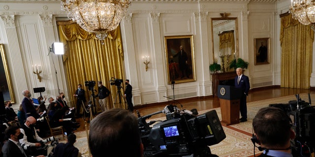 WASHINGTON, DC - JANUARY 19: U.S. President Joe Biden talks to reporters during a news conference in the East Room of the White House on January 19, 2022 in Washington, DC. With his approval rating hovering around 42 percent, Biden is approaching the end of his first year in the Oval Office with inflation soaring, COVID-19 raging and his legislative agenda stalled on Capitol Hill. (Photo by Chip Somodevilla/Getty Images)