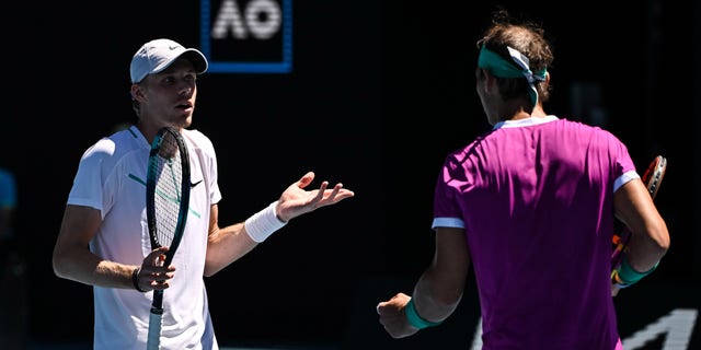 Dennis Shapovalov of Canada complains about how much time Rafael Nadal of Spain is taking between points during day nine of the 2022 Australian Open at Melbourne Park on Jan. 25, 2022, in Melbourne, Australia. 