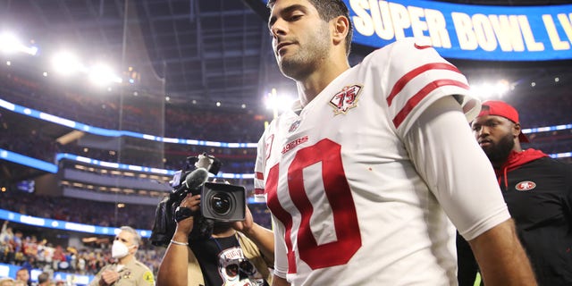 Jimmy Garoppolo walks off the field after the San Francisco 49ers lost the NFC Championship Game to the Los Angeles Rams, 20-17, at SoFi Stadium on Jan. 30, 2022 in Inglewood, California.