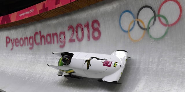 Jamaica's Jazmine Fenlator-Victorian and Jamaica's Carrie Russell compete in the women's bobsled heat at the Winter Olympic Games, feb. 20, 2018, in South Korea.